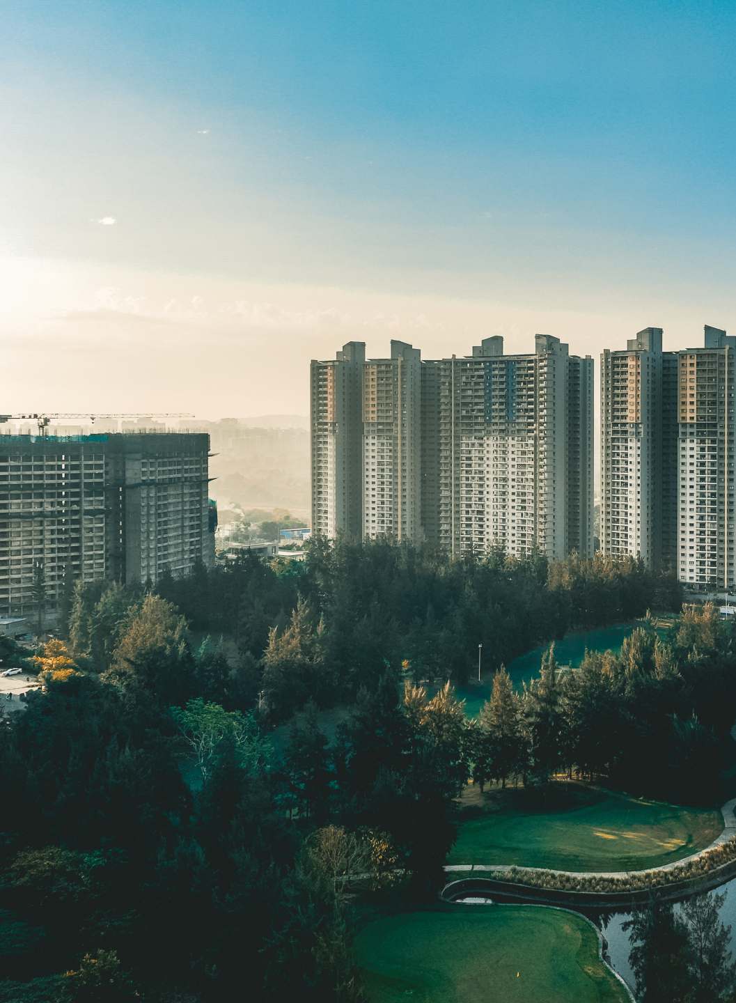 Aerial view of Blue Ridge township towers and golf greens, Hinjawadi